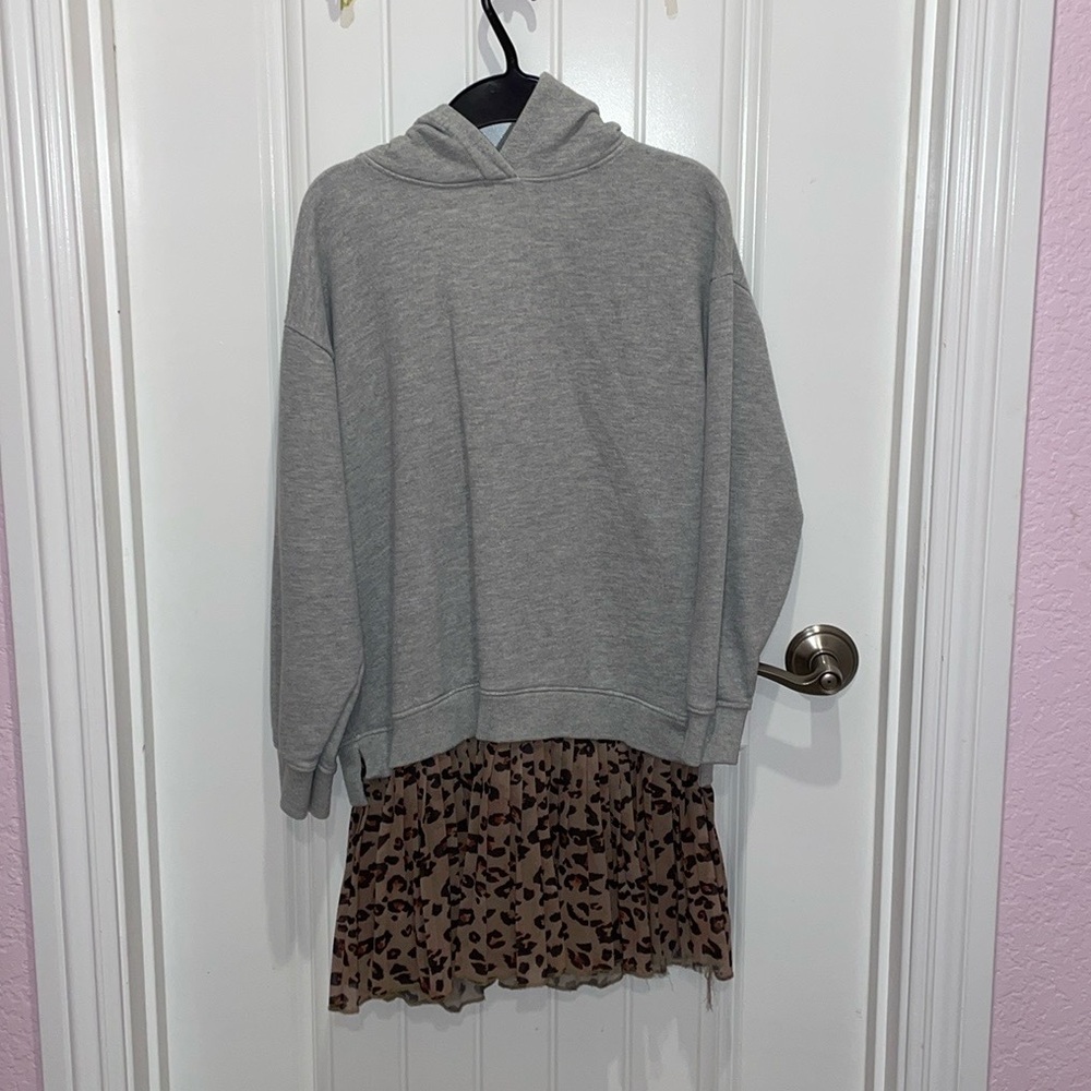Gray sweater with leopard print skirt attached.